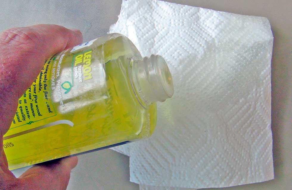 Pour a Generous Portion of Lemon Oil On a Cloth